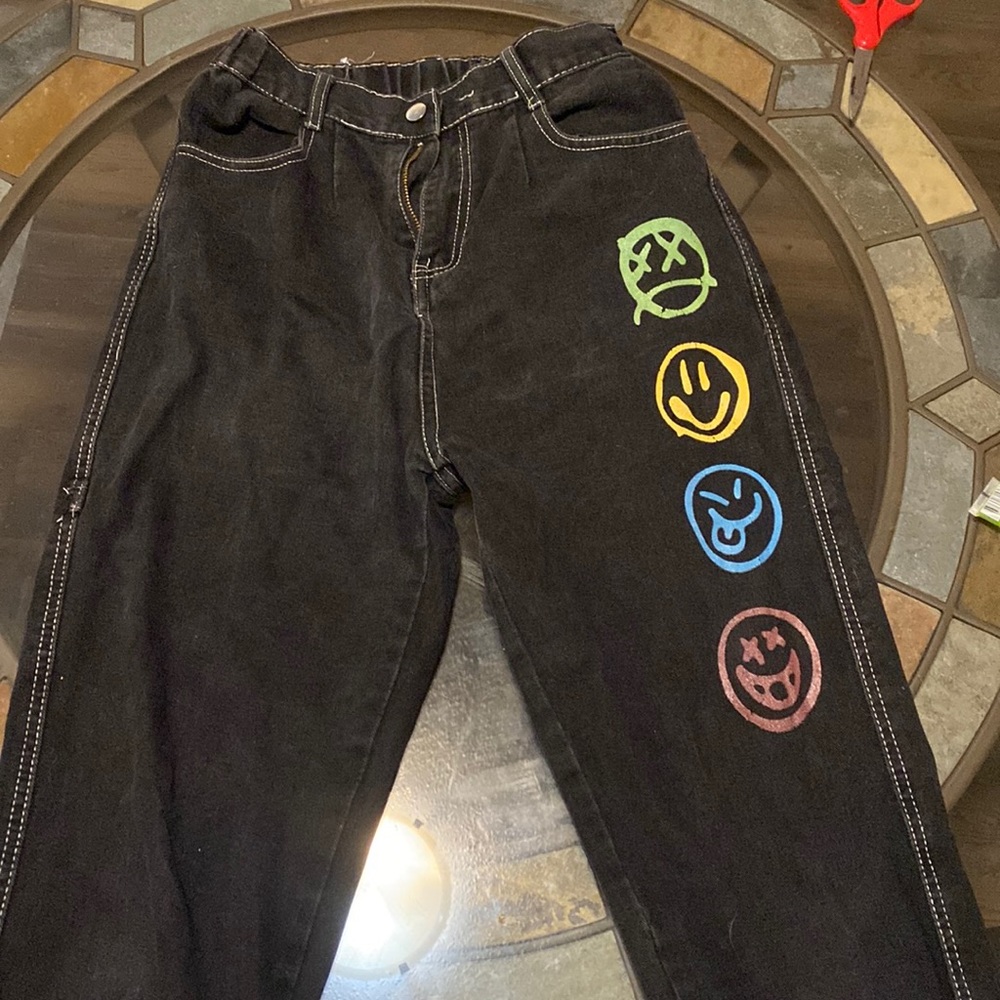 Black smiley pants from Hot Topic